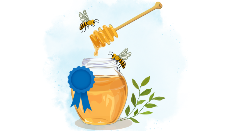 A jar of honey with a blue ribbon and bees flying around the jar.